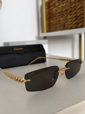 Cartier Gold Rimless Sunglasses with Dark Lenses